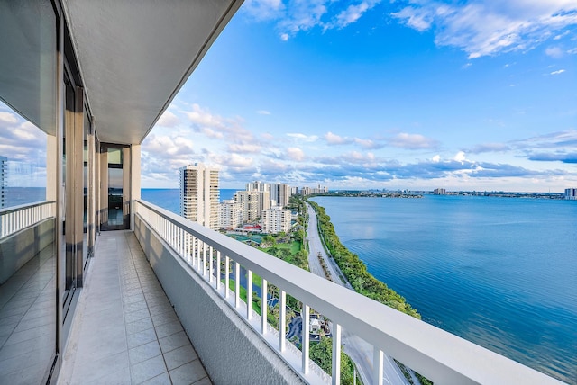 balcony featuring a water view