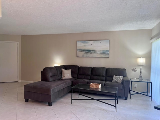 living room with tile flooring and a textured ceiling