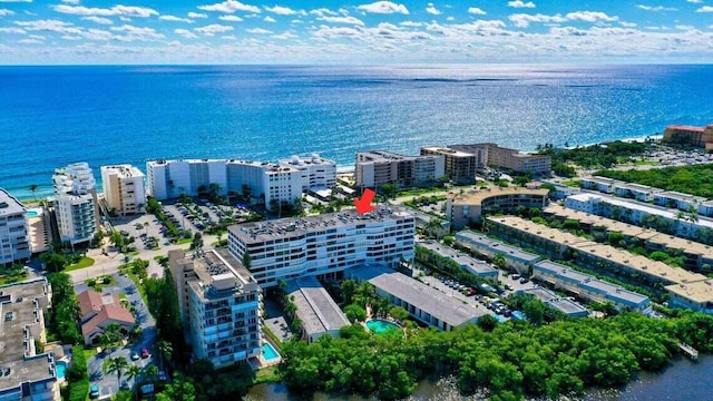 aerial view with a water view and a view of city