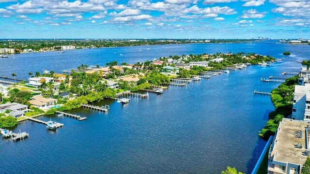 drone / aerial view with a water view