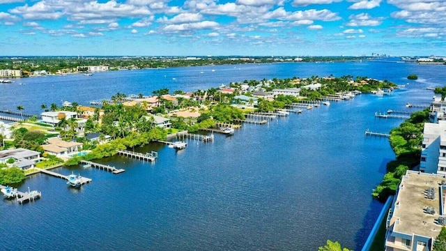 birds eye view of property featuring a water view