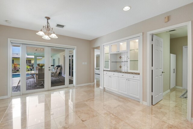 interior space with a notable chandelier