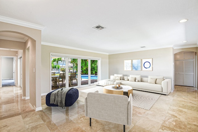 living room featuring crown molding and french doors