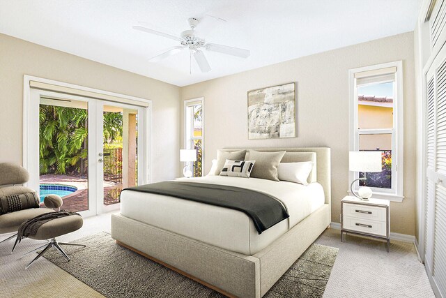 bedroom featuring access to exterior, ceiling fan, a closet, french doors, and carpet floors