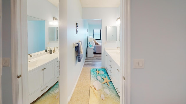 bathroom with vanity and hardwood / wood-style flooring