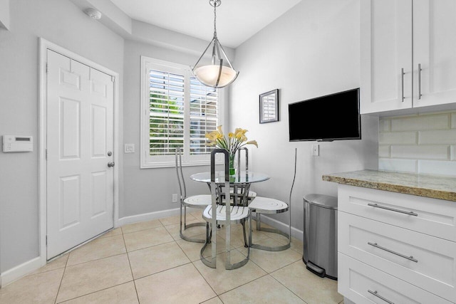 view of tiled dining area