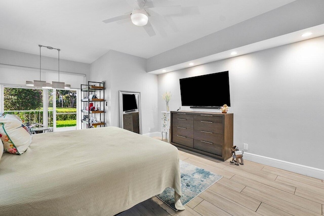 bedroom with ceiling fan and light wood-type flooring