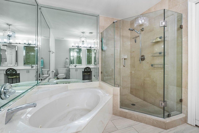 full bathroom featuring vanity, separate shower and tub, a notable chandelier, tile patterned flooring, and toilet