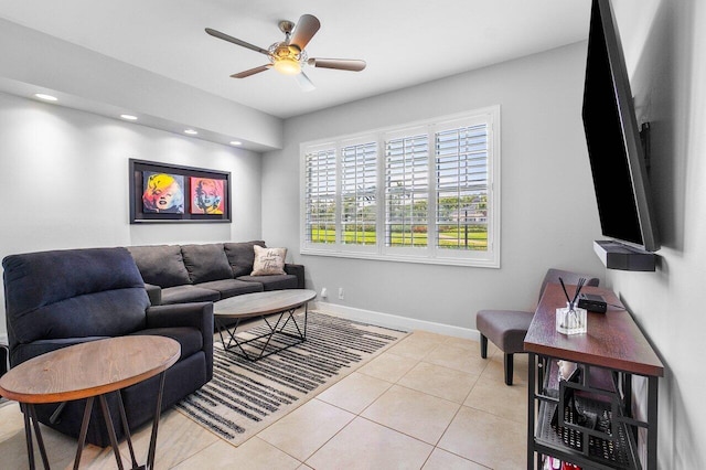 tiled living room with ceiling fan