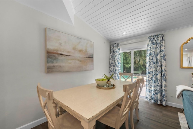 dining area featuring dark hardwood / wood-style flooring and lofted ceiling