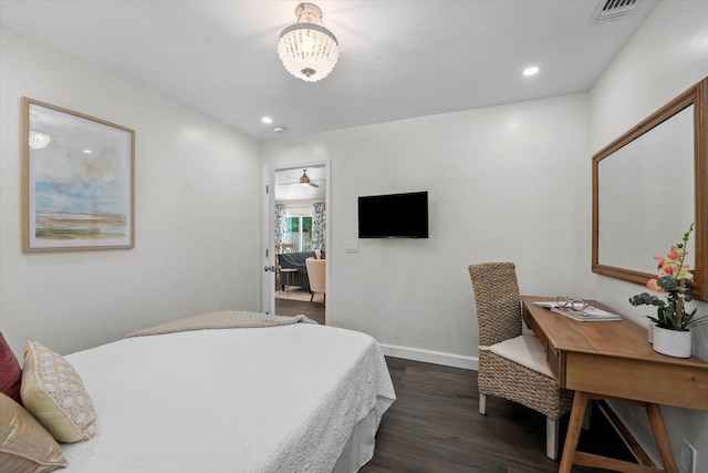 bedroom featuring dark hardwood / wood-style floors