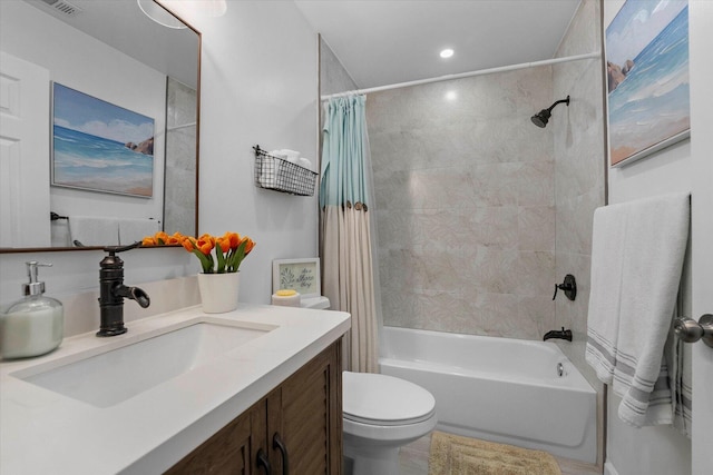 full bathroom with toilet, shower / bathtub combination with curtain, and vanity