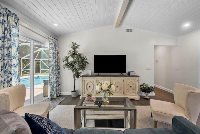 living room featuring vaulted ceiling with beams, dark wood-type flooring, and ornamental molding