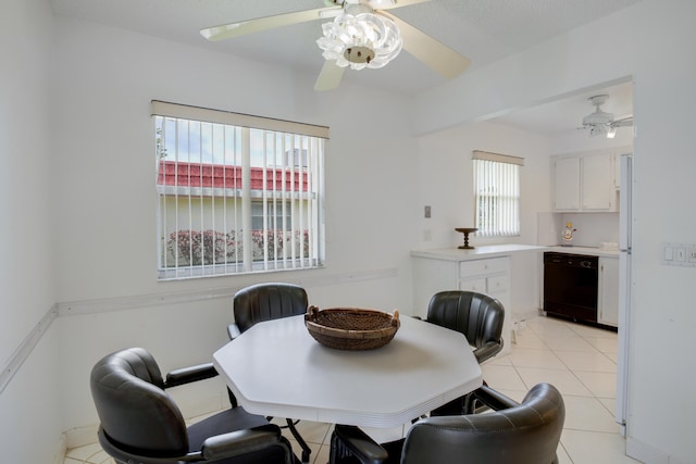 dining area featuring light tile patterned flooring and ceiling fan