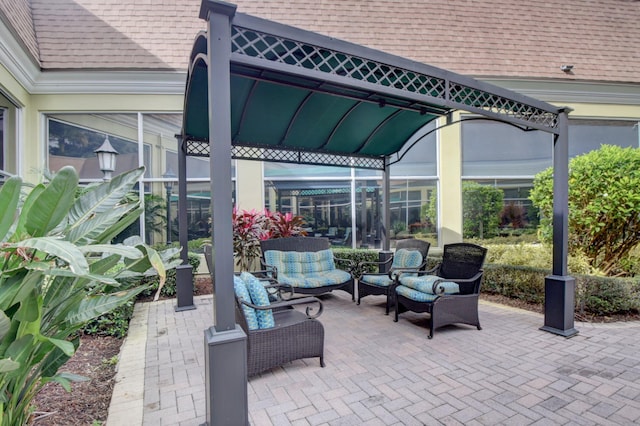 view of patio featuring a gazebo and outdoor lounge area