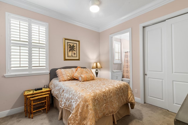 bedroom with ornamental molding, light colored carpet, and baseboards