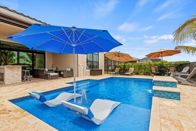 view of swimming pool featuring a fenced in pool, an outdoor hangout area, a patio area, fence, and a water slide