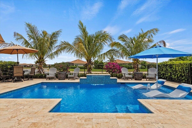 view of pool with a fenced in pool, fence, and a patio