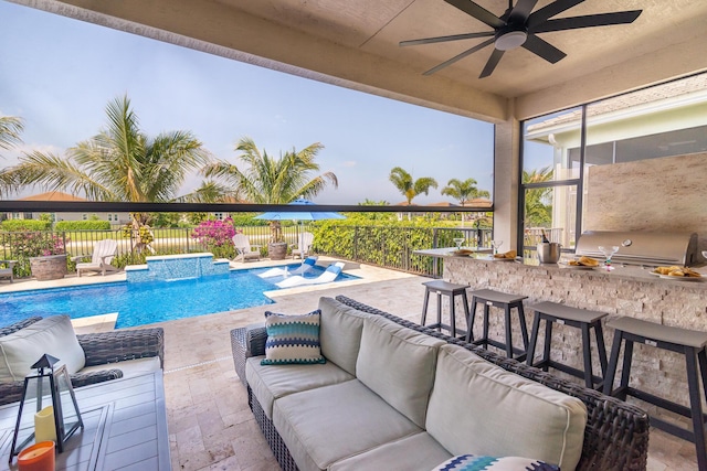 view of swimming pool with area for grilling, a patio, outdoor lounge area, and fence