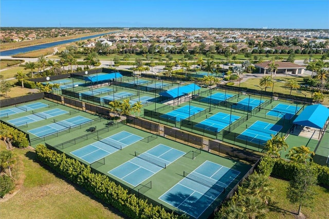 birds eye view of property with a residential view