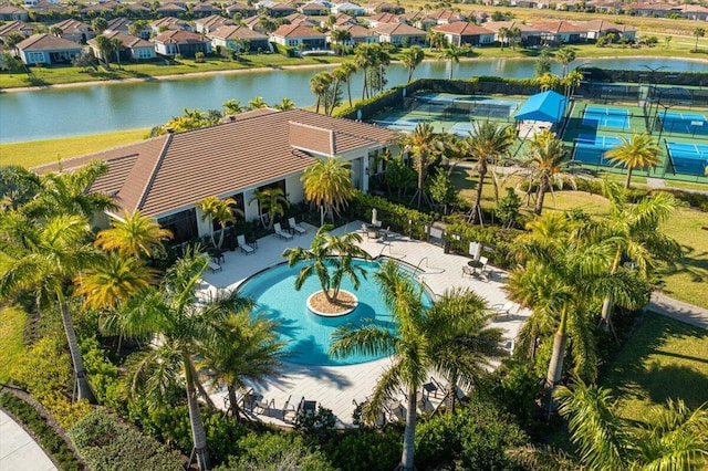 aerial view featuring a water view and a residential view