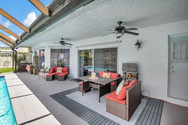 view of patio / terrace with ceiling fan and an outdoor hangout area