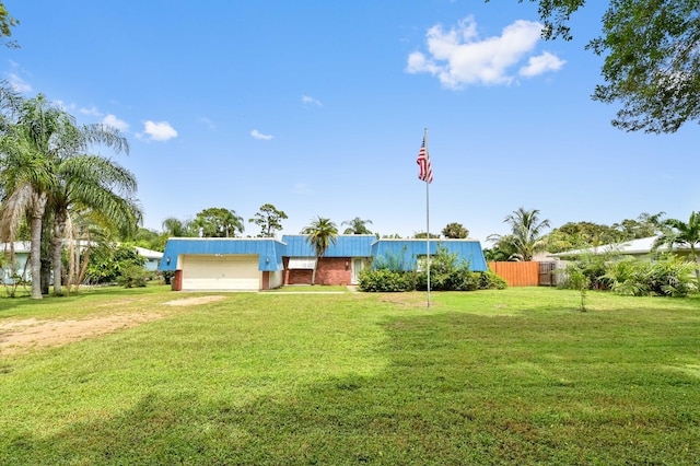 view of yard with a garage