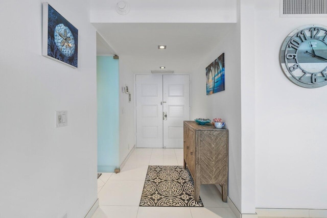 interior space featuring light tile patterned floors