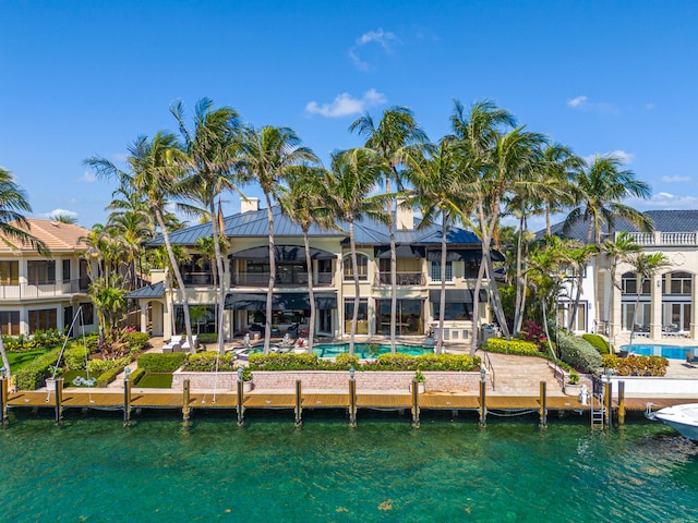 rear view of house with a water view