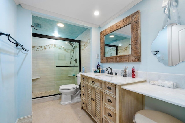 bathroom featuring tile flooring, ornamental molding, a shower with door, vanity, and toilet