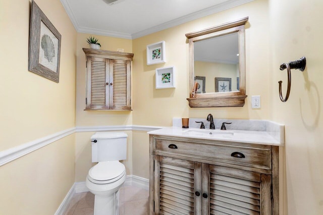 bathroom with ornamental molding, tile flooring, toilet, and vanity