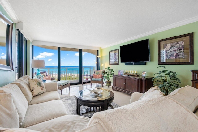 tiled living room featuring a textured ceiling, a wall of windows, crown molding, and a water view