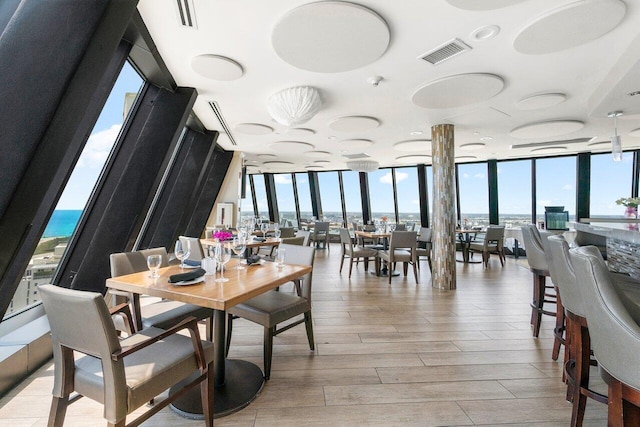 dining room featuring expansive windows