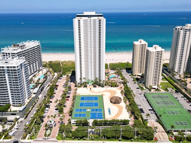 bird's eye view with a view of the beach and a water view