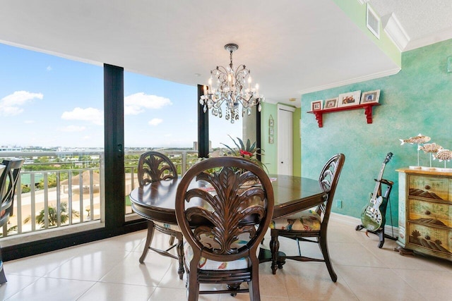 dining room featuring a healthy amount of sunlight, tile flooring, ornamental molding, and a notable chandelier