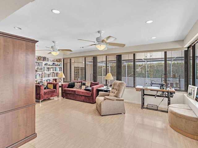 tiled living room featuring ceiling fan