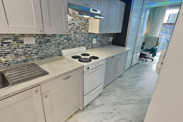 kitchen featuring light tile patterned flooring, decorative backsplash, gray cabinets, and white electric range oven