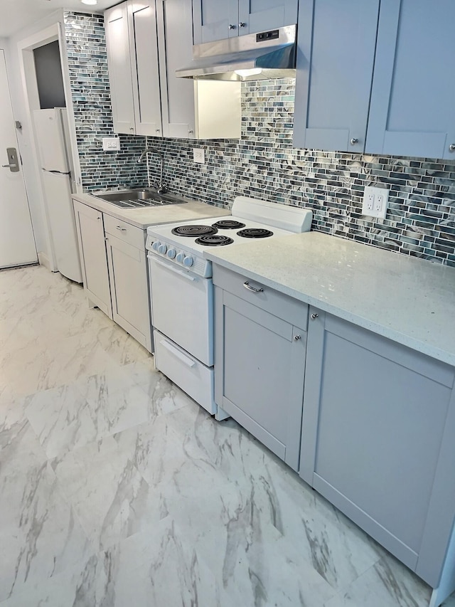 kitchen featuring light tile patterned floors, backsplash, white appliances, and sink