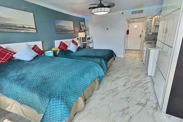 bedroom with light tile patterned floors