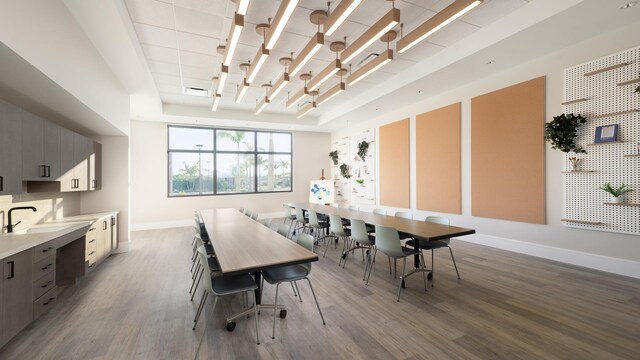 recreation room featuring golf simulator, wine cooler, and light hardwood / wood-style floors