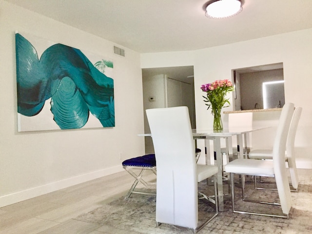 dining room featuring hardwood / wood-style floors