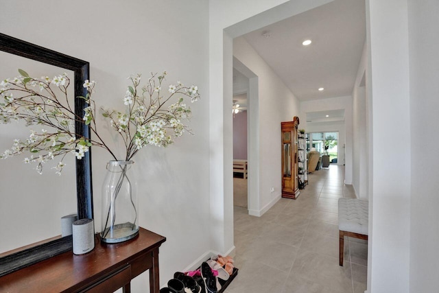 hallway with light tile floors