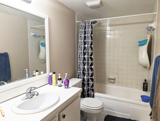 full bathroom with shower / bath combo with shower curtain, vanity, toilet, and tile patterned flooring