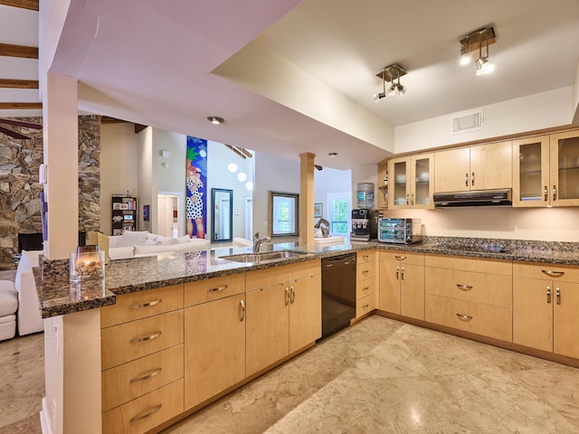 18238 128th Trl N, Jupiter, FL 33478 - kitchen featuring black appliances, light brown cabinetry, decorative columns, a sink, and dark stone counters