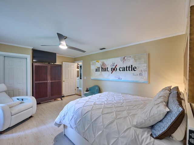 18238 128th Trl N, Jupiter, FL 33478 - bedroom with ornamental molding, wood finished floors, and ceiling fan