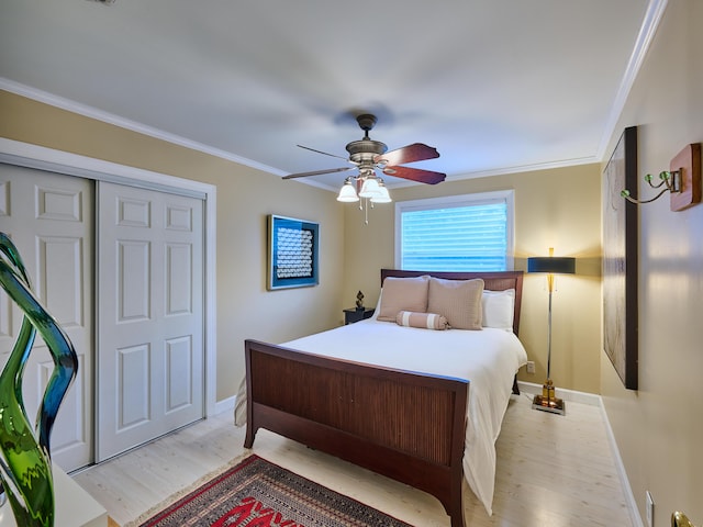 18238 128th Trl N, Jupiter, FL 33478 - bedroom featuring light wood finished floors, baseboards, crown molding, and a ceiling fan