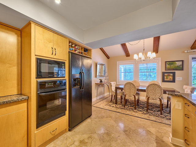 kitchen featuring light brown cabinets, dark stone countertops, pendant lighting, black appliances, and a notable chandelier