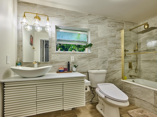 18238 128th Trl N, Jupiter, FL 33478 - bathroom with tiled shower / bath combo, toilet, tile walls, and vanity