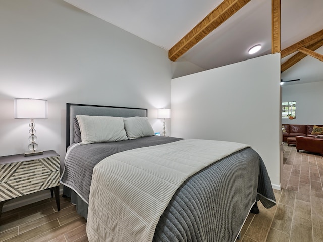 18238 128th Trl N, Jupiter, FL 33478 - bedroom featuring wood tiled floors, beam ceiling, high vaulted ceiling, and baseboards
