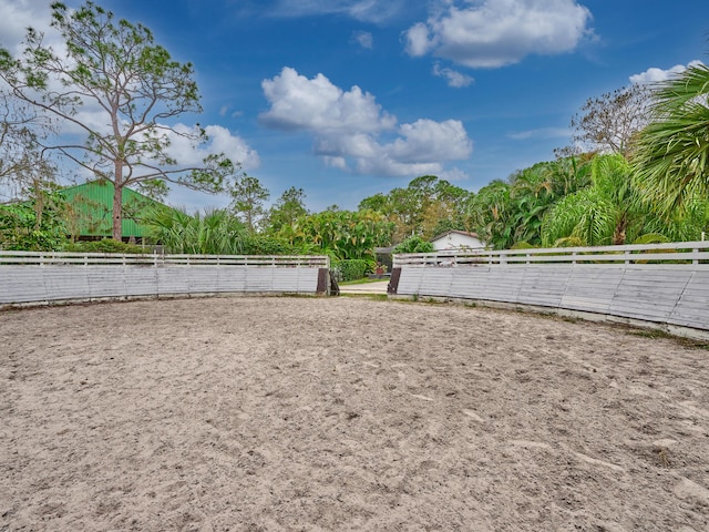 18238 128th Trl N, Jupiter, FL 33478 - view of yard featuring an outdoor riding arena and fence